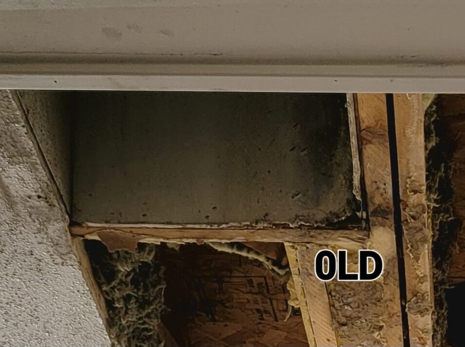 Rusted, mold-damaged return-air duct with the surrounding drywall failing.